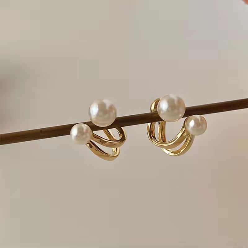Orecchini Dorati con Dettagli Eleganti - SLK
